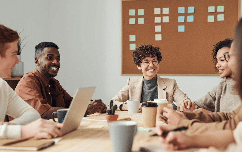 A group of professionals collaborating in a modern office space